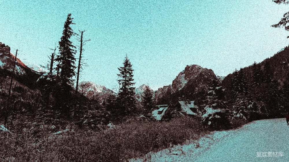 高清摄影  一个人在一条覆有白雪的道路旁行走