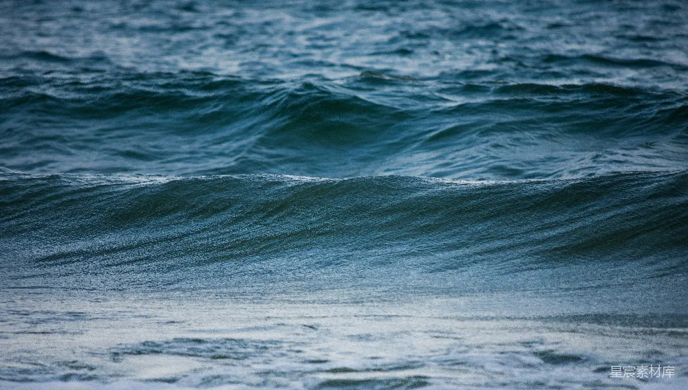 高清摄影 海浪上一个冲浪板上的骑手
