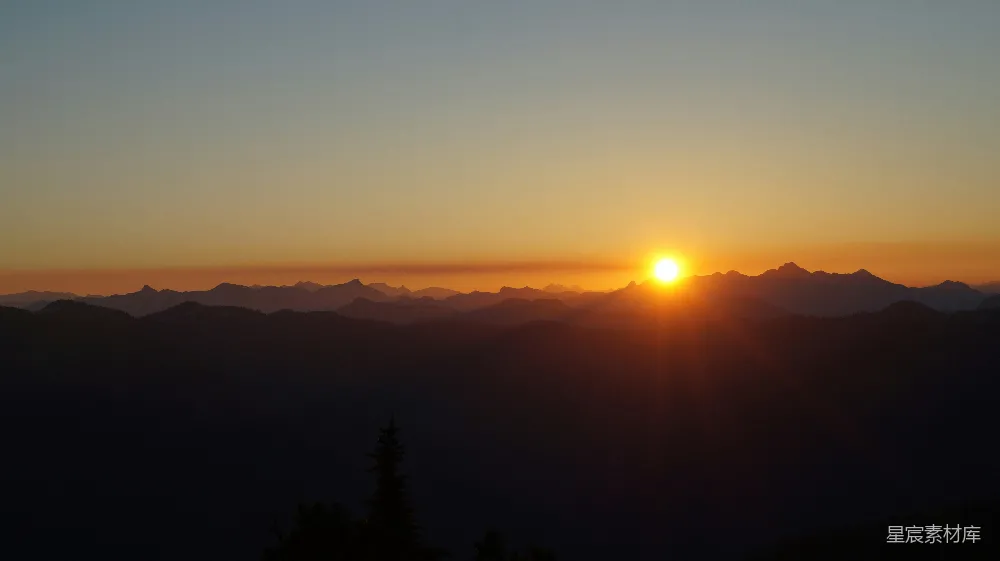 高清摄影 山峦之上日落的景象