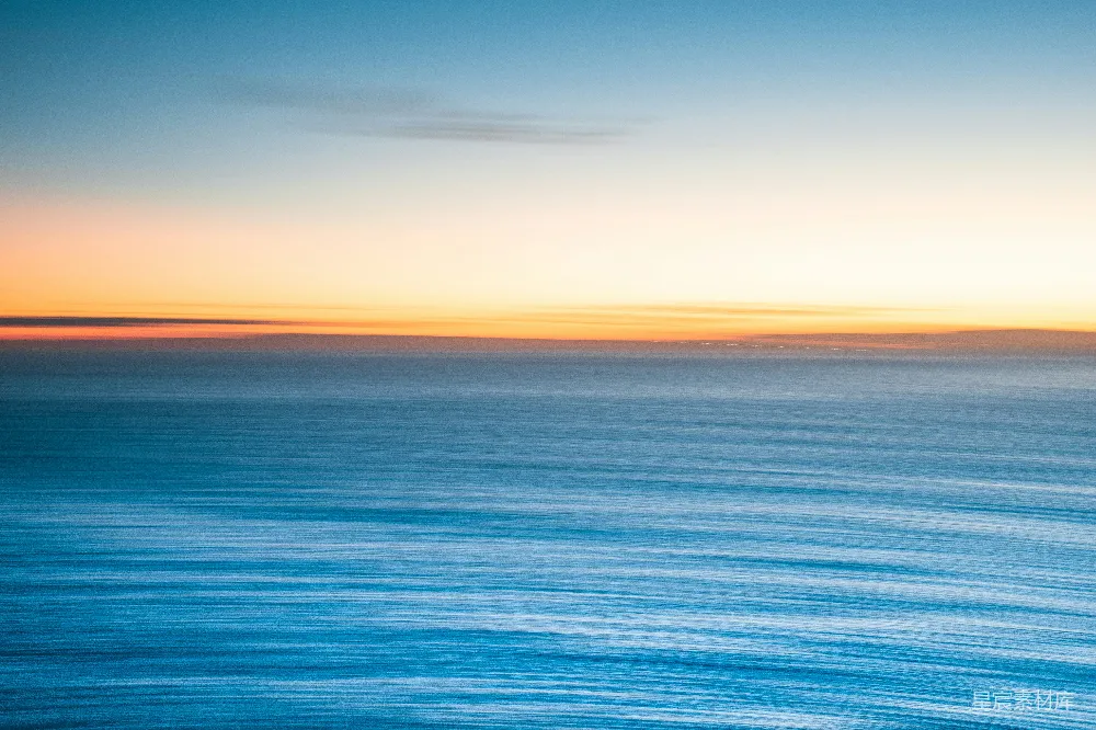 高清摄影 傍晚夕阳下的模糊海景图