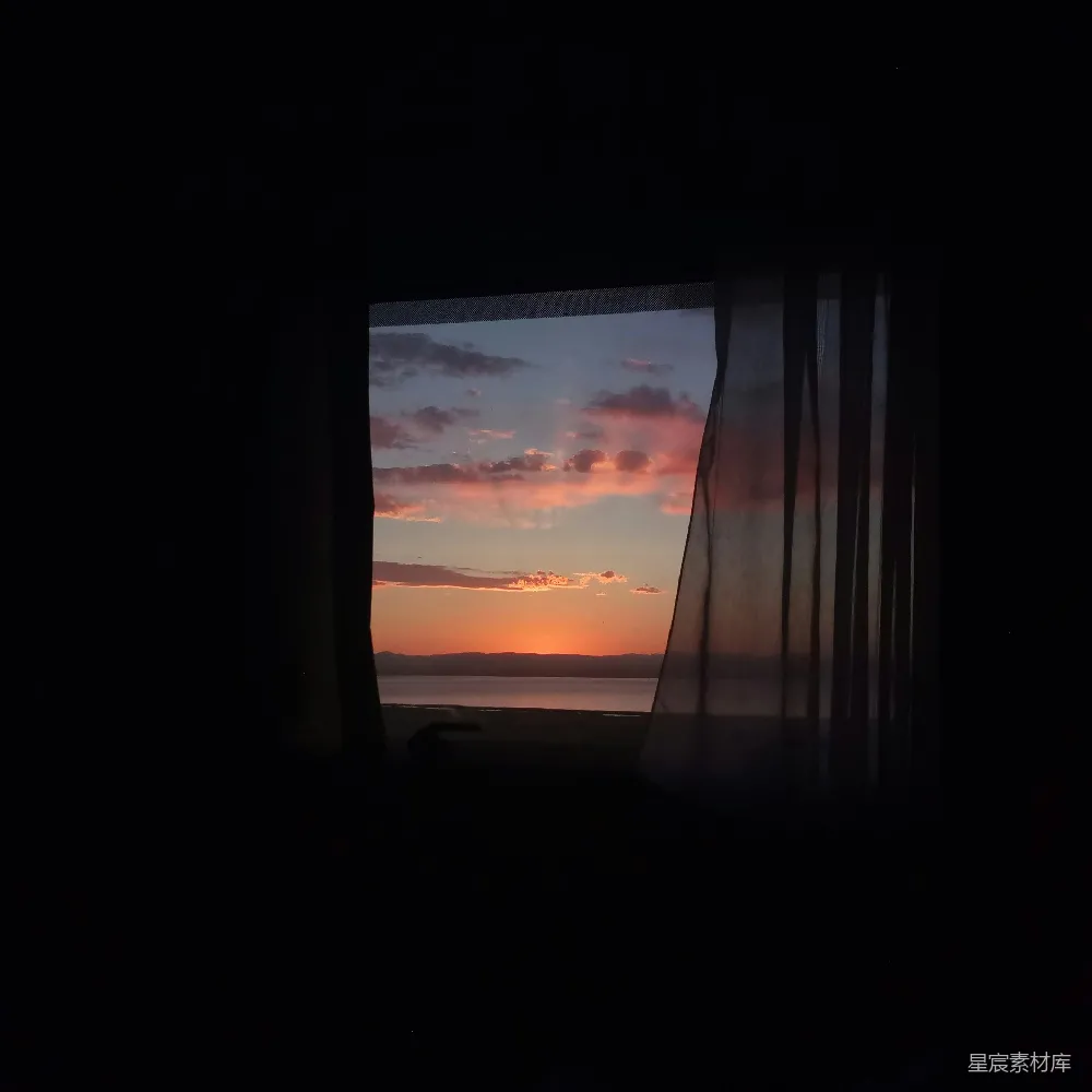 高清摄影 带海景 sunset 窗帘的窗户