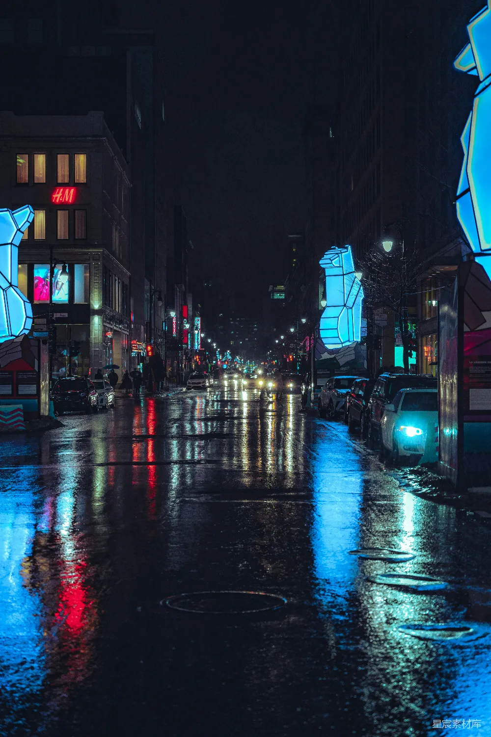 高清摄影 夜晚的城市街道，路边停着汽车。