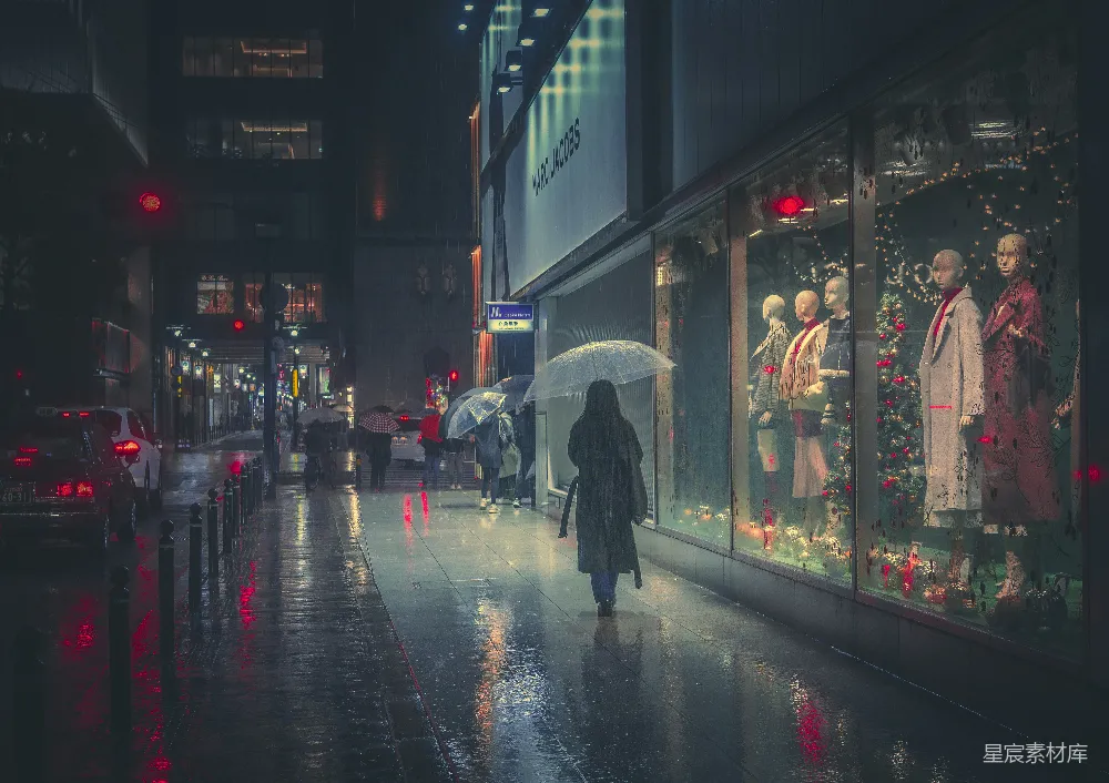 高清摄影 一个人在雨中走在人行道上撑着伞