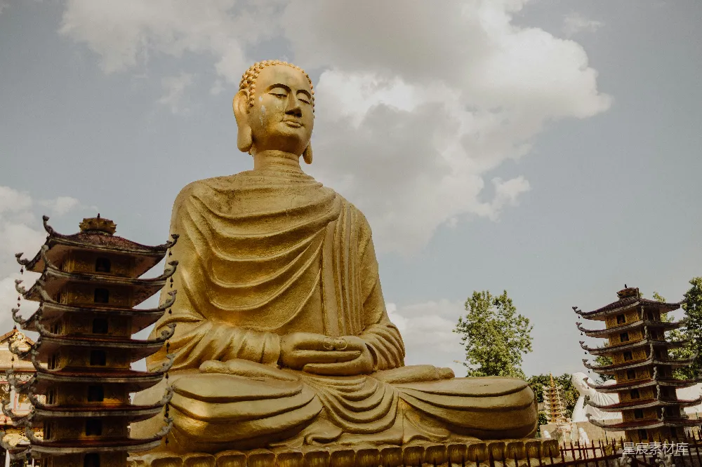 高清摄影 一座佛像坐在宝塔前