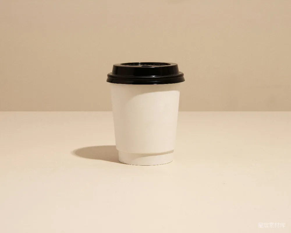 高清摄影  一个带有黑色盖子的白色咖啡杯