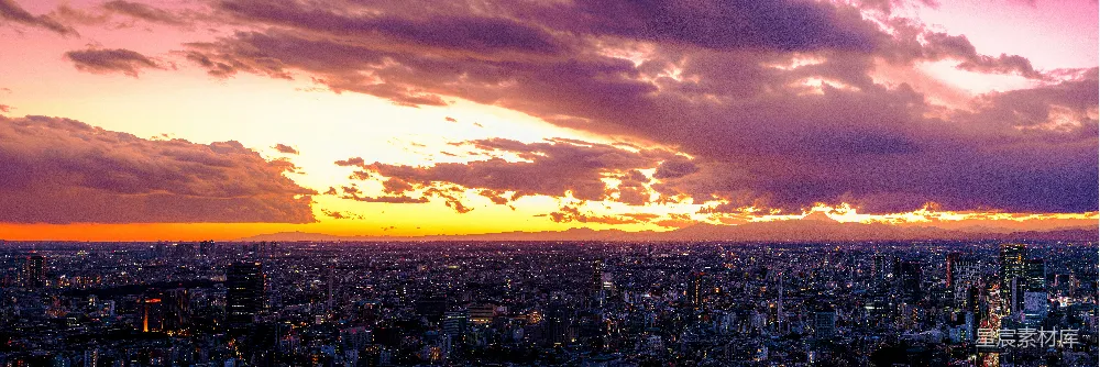 高清摄影  从建筑物顶部俯瞰落日中的城市景色