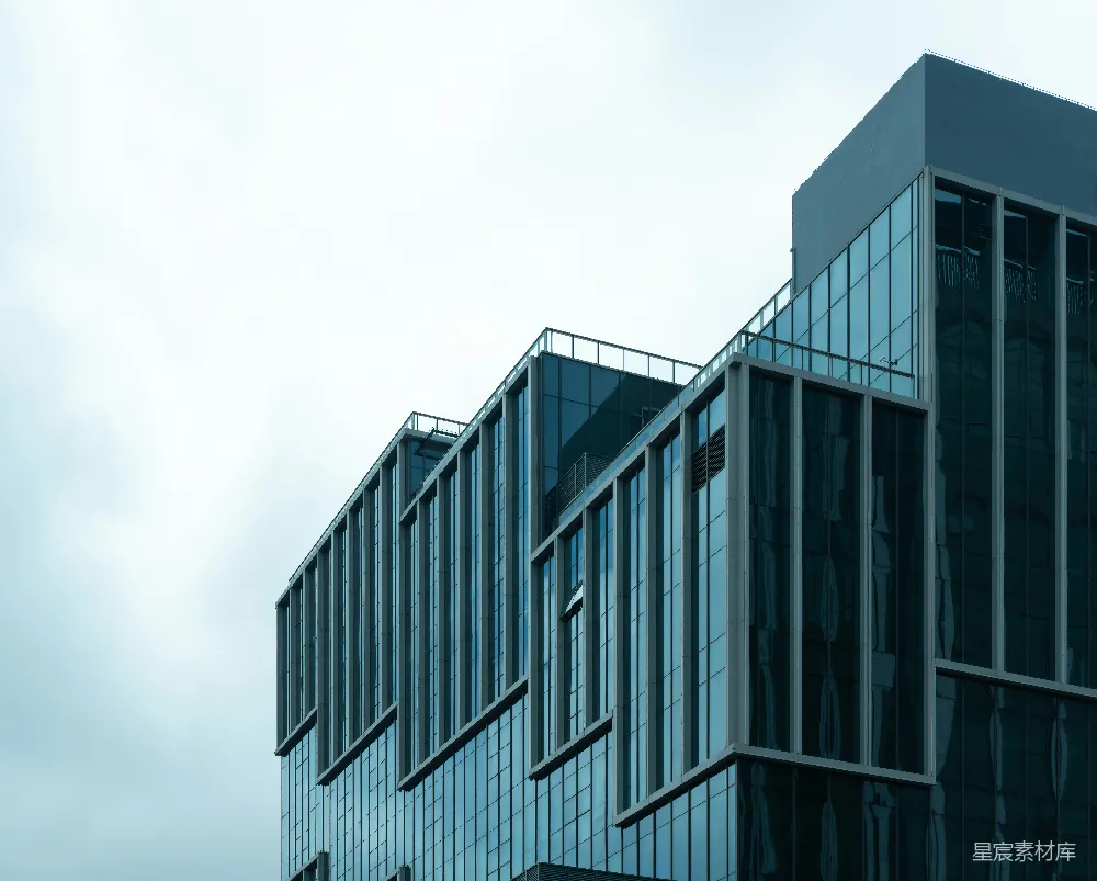 高清摄影  现代玻璃建筑在多云的天空下