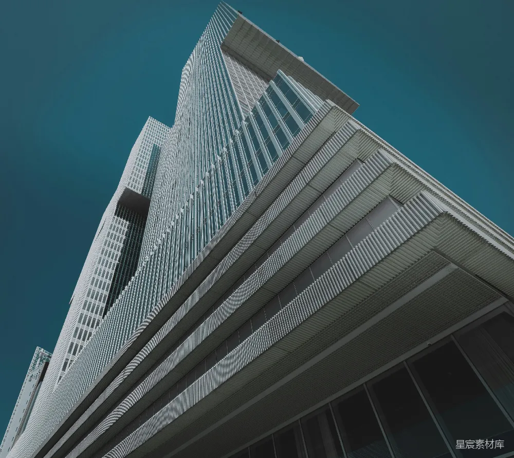 白混凝土建筑在蓝天白云下的白天景象