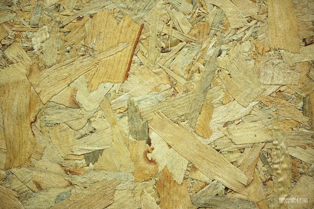 高清摄影  棕色的木头原木放在棕色的木制表面上