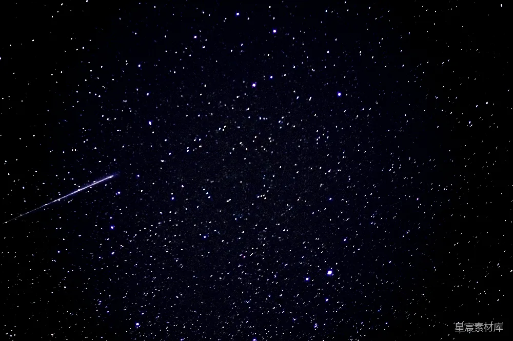 高清摄影  一个星空，点缀着星星和一颗流星。