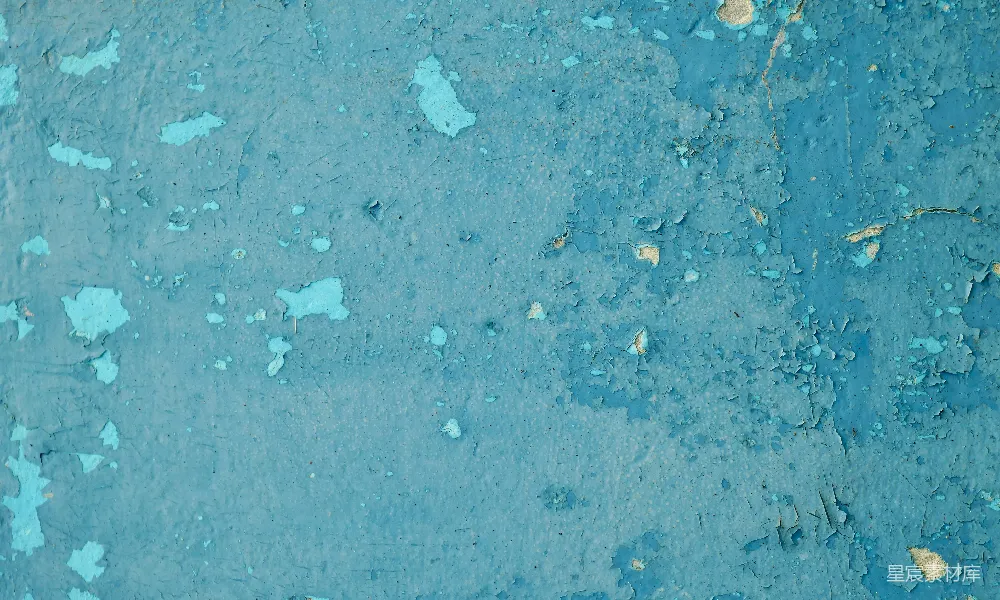 高清摄影  一堵蓝色的墙，上面的油漆剥落。
