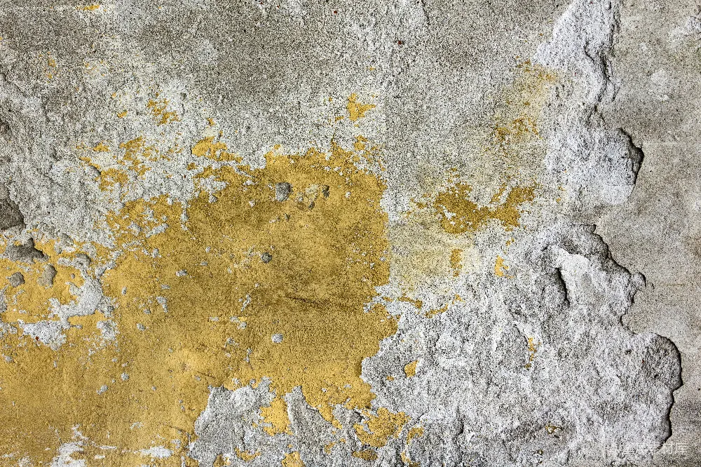 高清摄影  一堵黄灰相间的墙，油漆剥落。