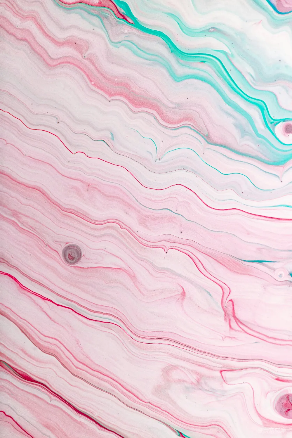 高清摄影  一幅粉色和蓝色的抽象画，画中有圆形。