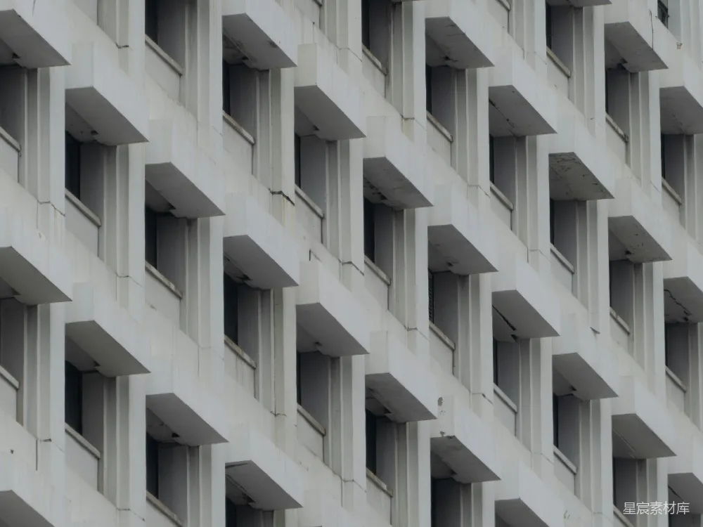 高清摄影  混凝土建筑上相同窗框的排列方式
