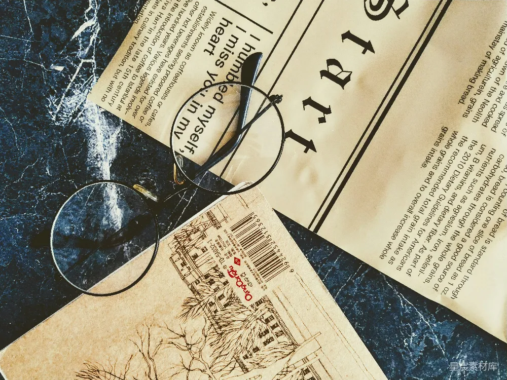 高清摄影  白色打印纸在蓝白织物上
