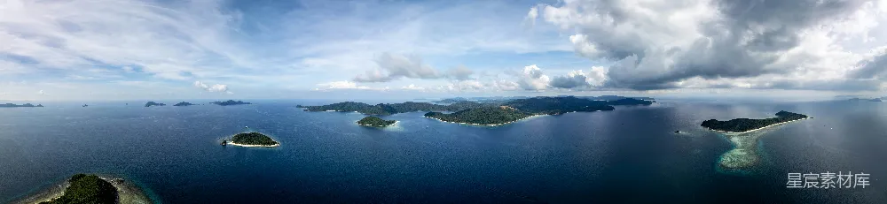 高清摄影  散布在一片浩瀚的蓝色海洋之下的岛屿。