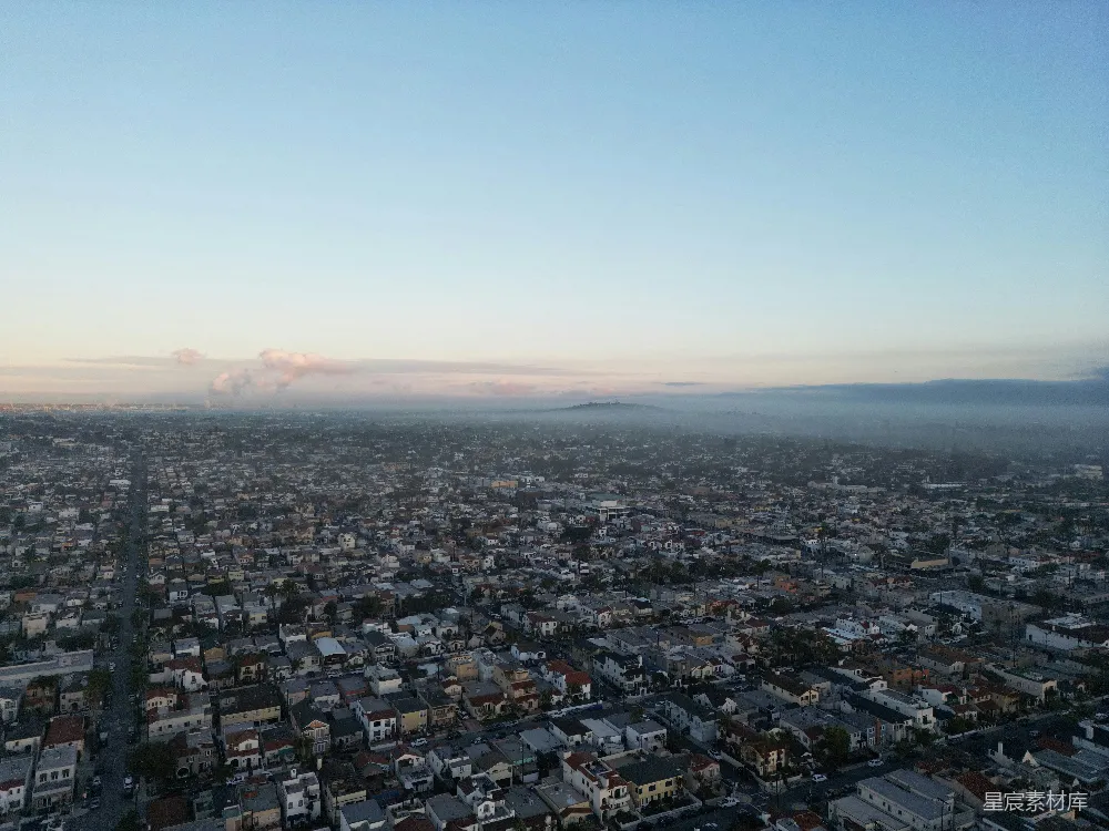 高清摄影  夕阳下城市的航拍视角