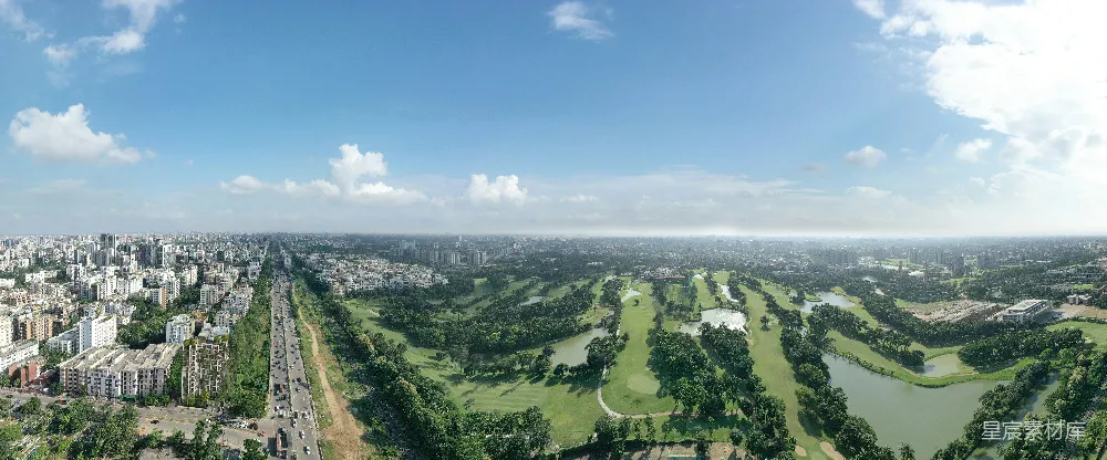 高清摄影  城市建筑群和高尔夫球场的空中俯瞰图