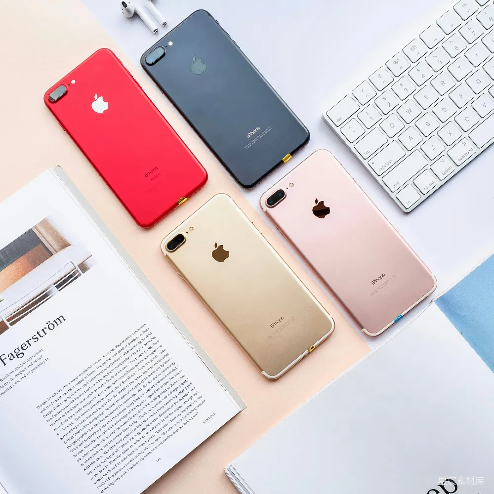 高清摄影  桌上摆放着四款不同颜色的iPhone 7 Plus手机。