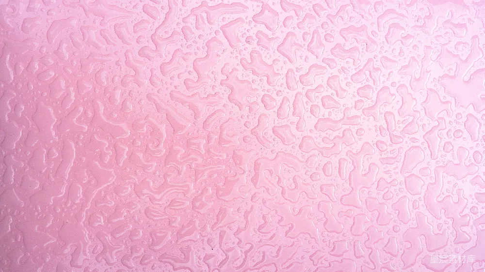 高清摄影  粉红色纹理表面的水珠特写。