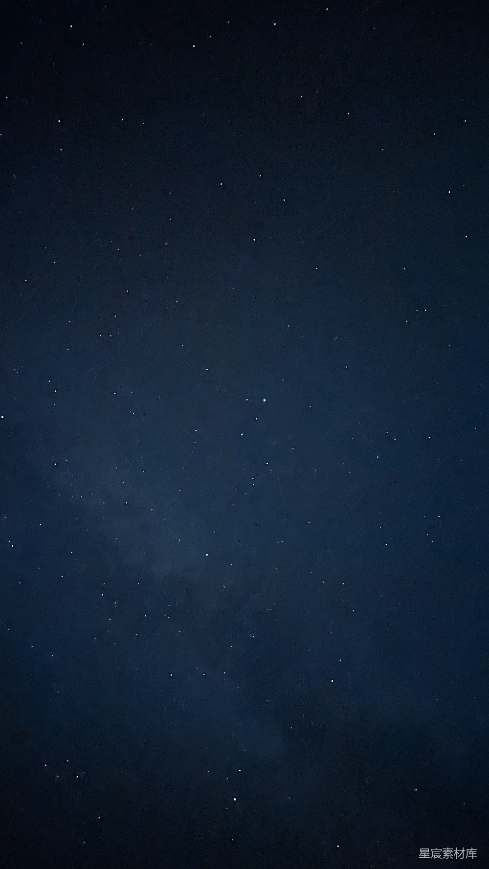 高清摄影  夜空中有星星，前景中有一架飞机。
