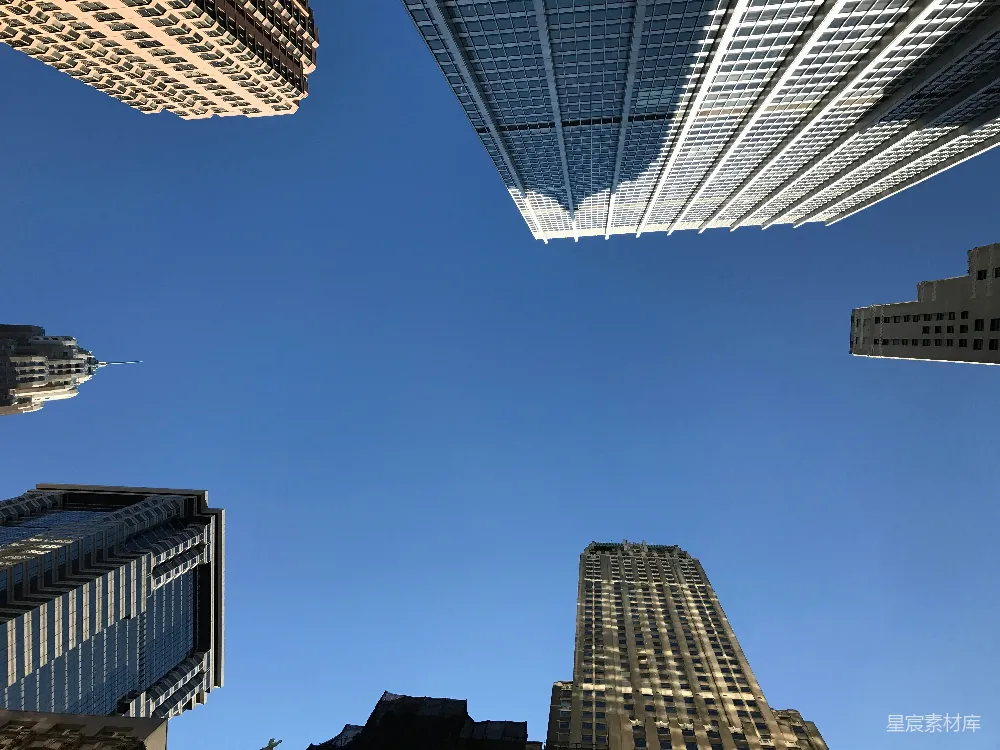 高清摄影  日间拍摄的白色和棕色高层建筑的低角度照片