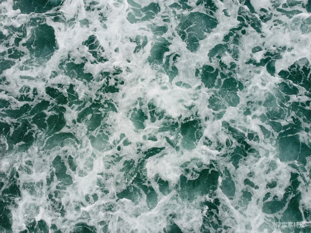 高清摄影  翻滚的海浪，白色的泡沫图案