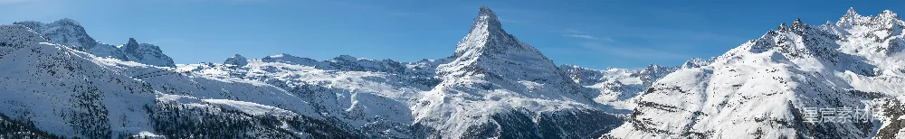 高清摄影  白天蓝天下覆盖着积雪的山峰