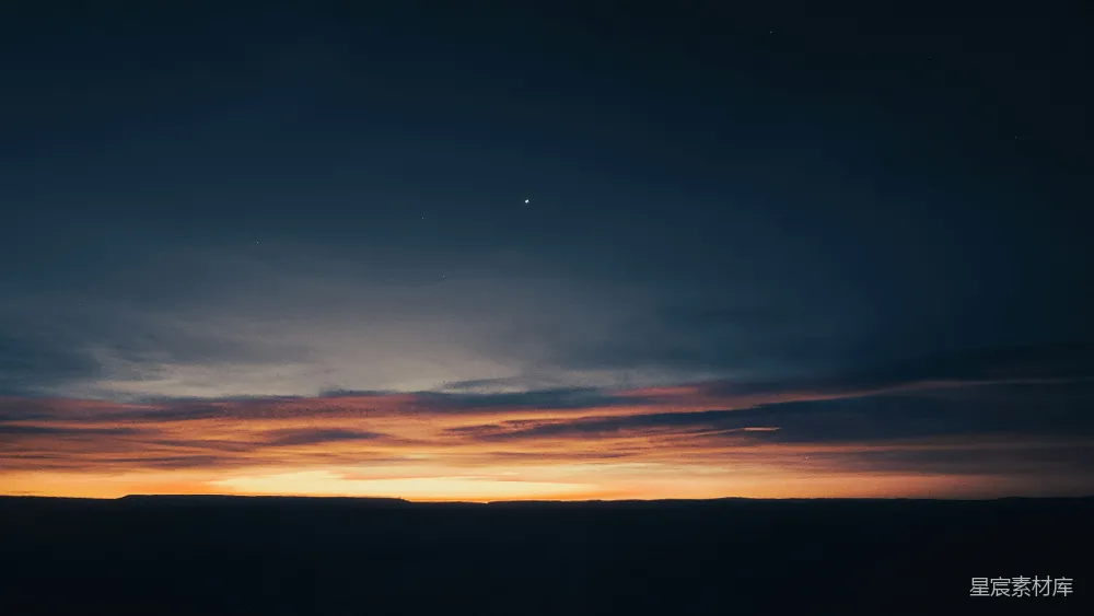 高清摄影  夕阳正在地平线上缓缓落下。