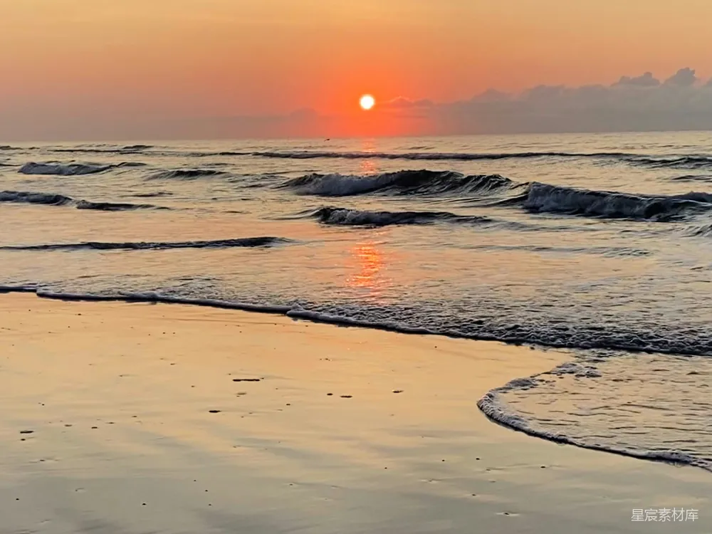 高清摄影  太阳正挂在海面上落下。