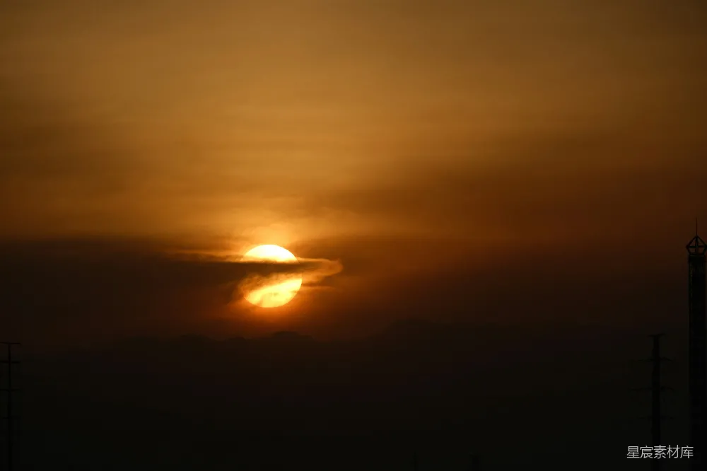 高清摄影  夕阳在塔后落下。