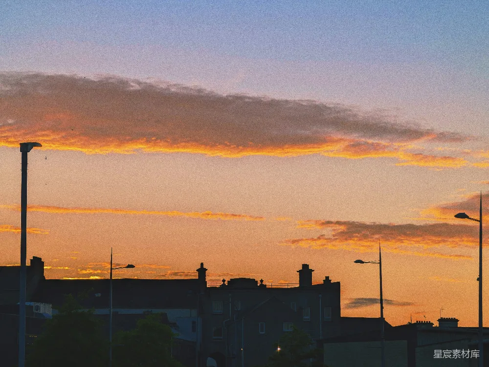高清摄影  城市中高耸建筑的夕阳景色