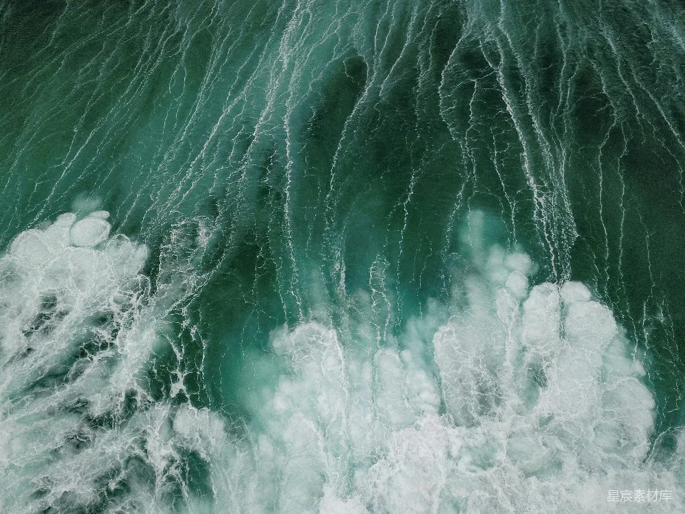 高清摄影  白色和绿色的海水