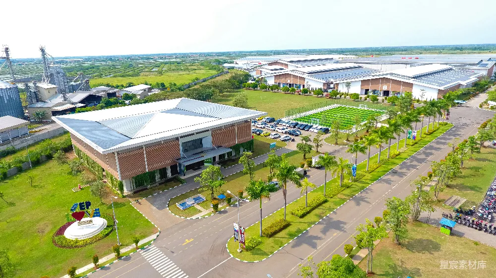 高清摄影  一座建筑及其停车场的空中俯瞰图