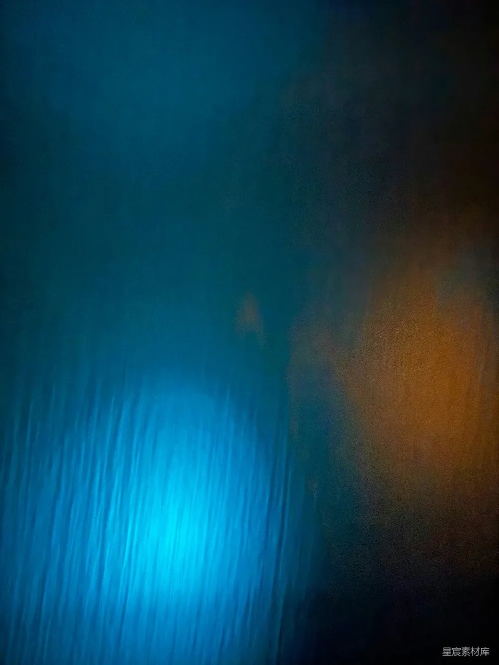 高清摄影 壁纸 蓝色和橙色的模糊灯光构成的抽象背景。