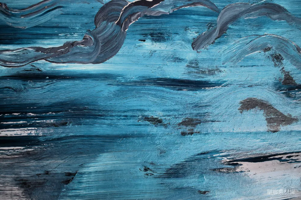 高清摄影  一幅蓝色海洋的画，带有波浪。