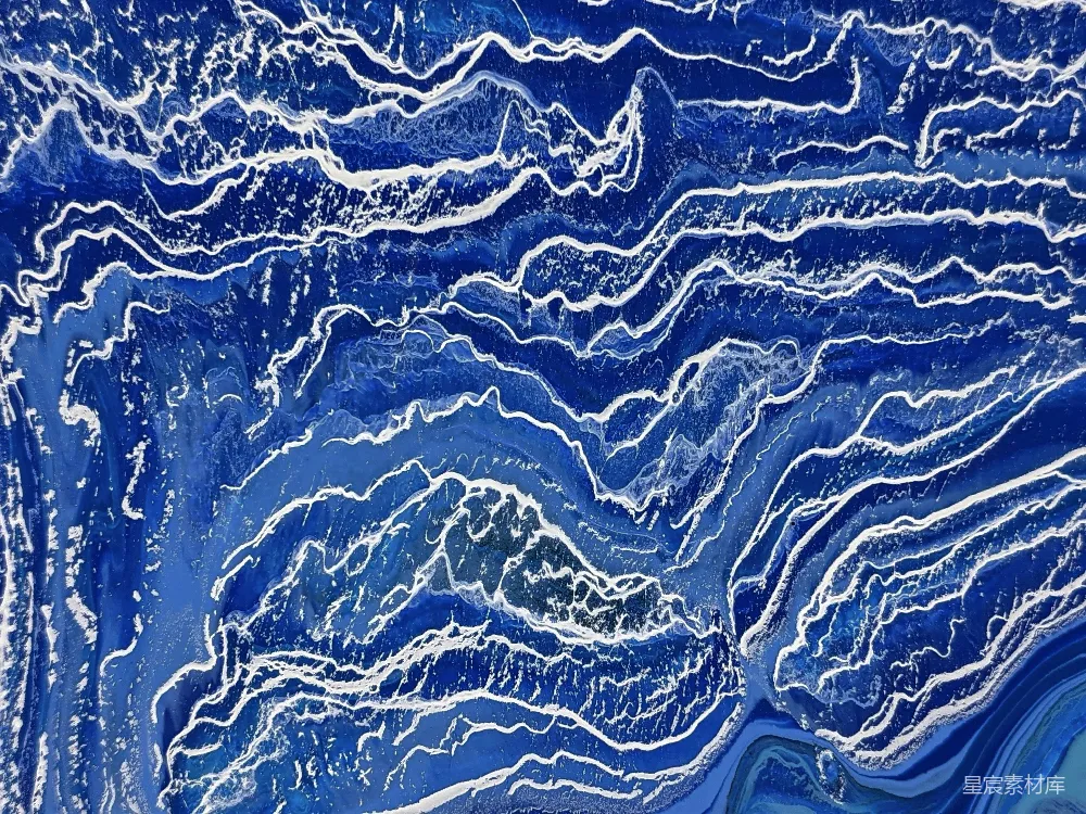 高清摄影  一幅蓝色和白色的波浪抽象画