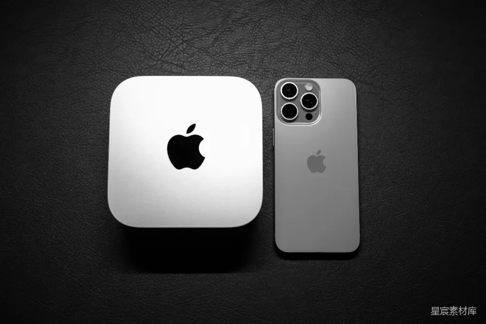高清摄影  一部白色的苹果iPhone手机放在另一部iPhone手机旁边。