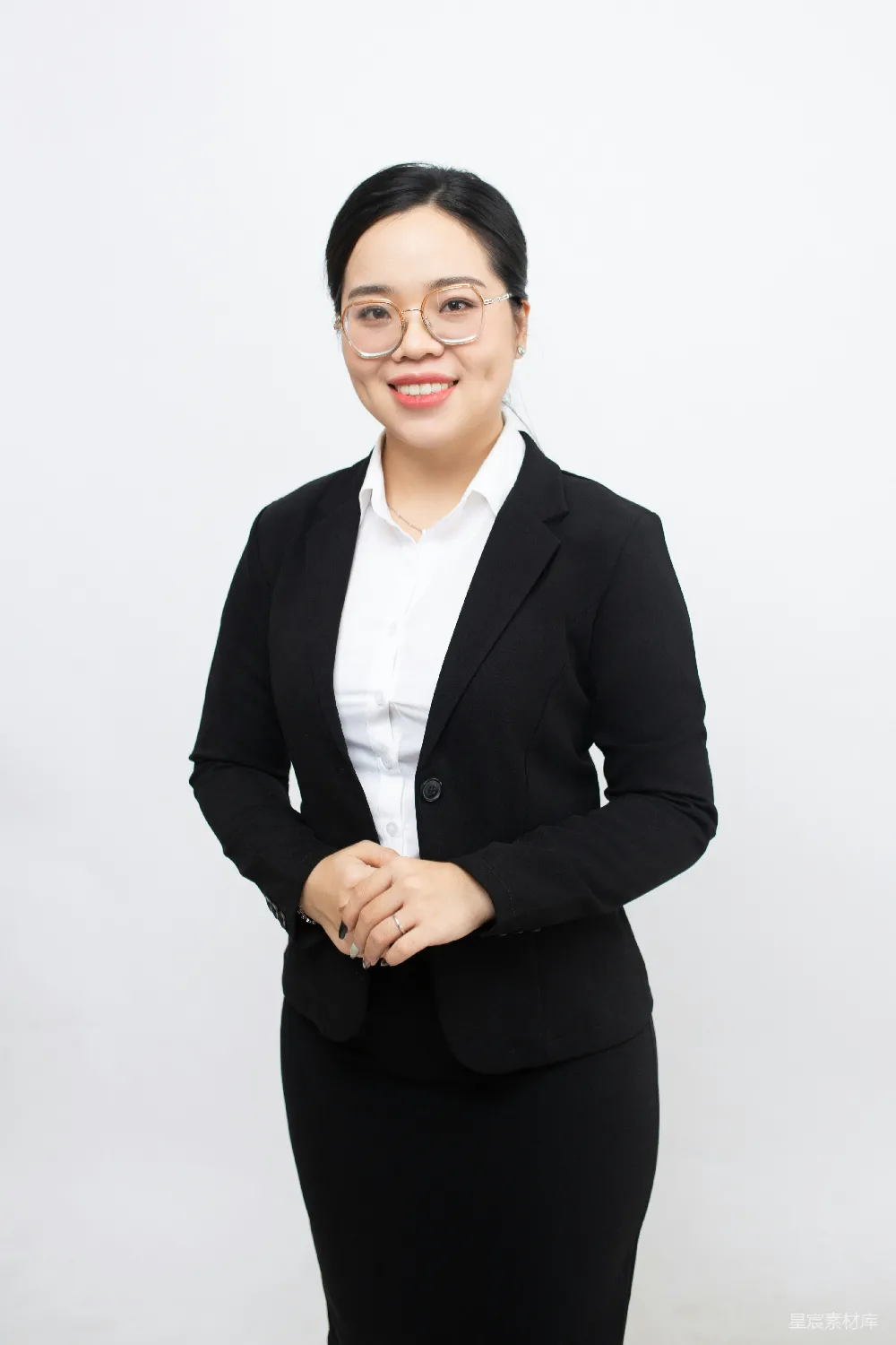 高清摄影  穿着职业装的女人摆姿势拍照