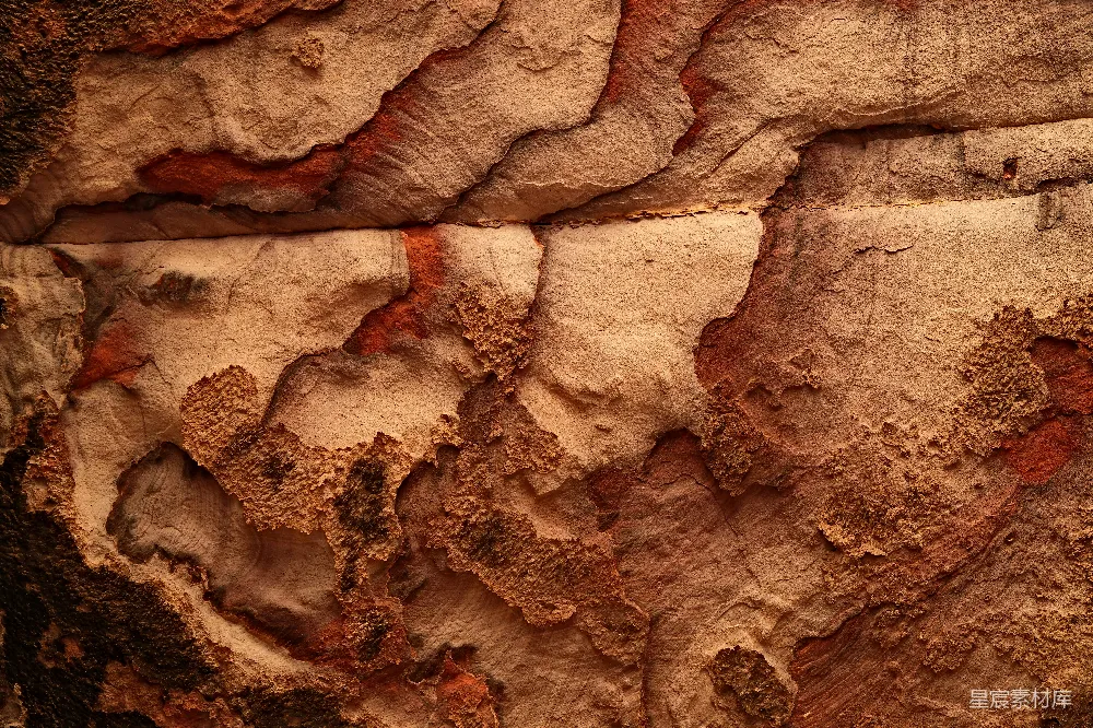 高清摄影  岩石的特写，纹理清晰，红色和白色图案交织。