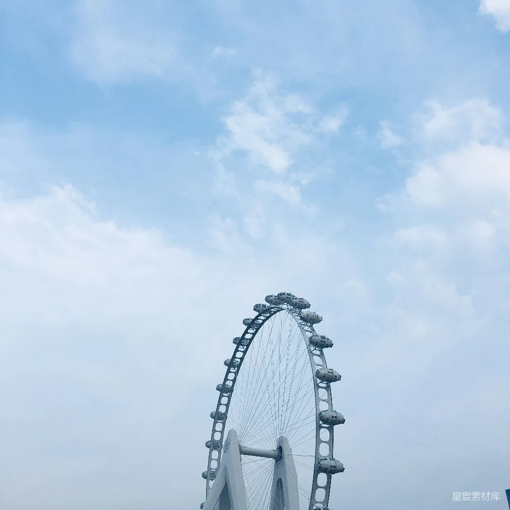 高清摄影  白天白云下的白色摩天轮