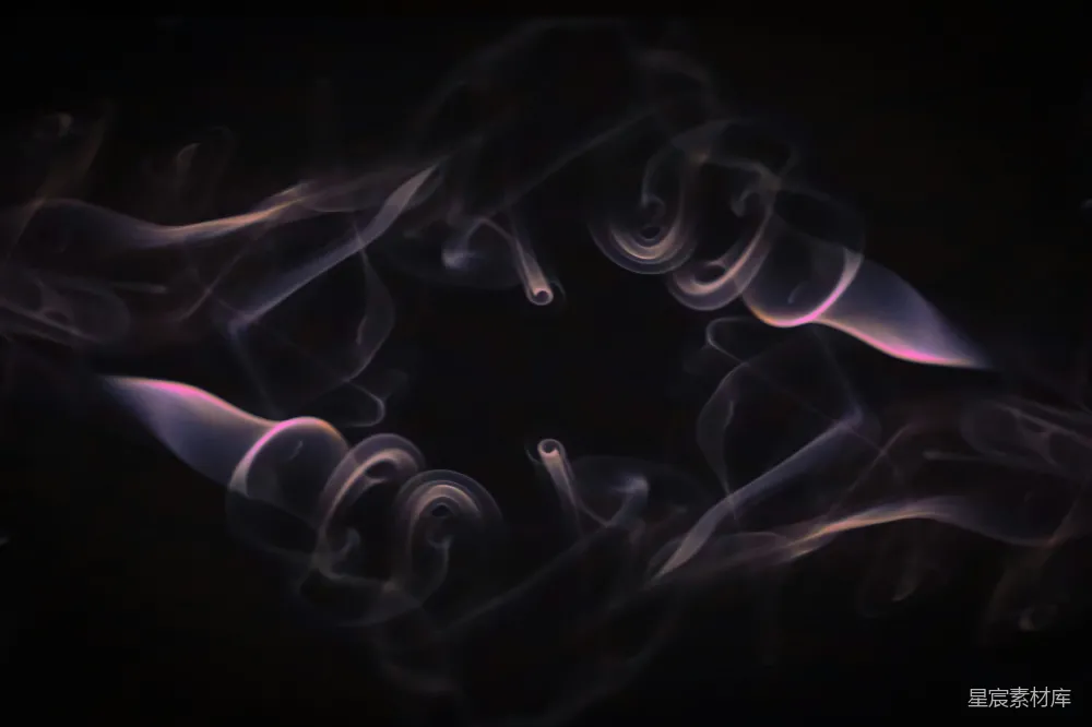 高清摄影  一个黑色背景，周围有烟雾缭绕。