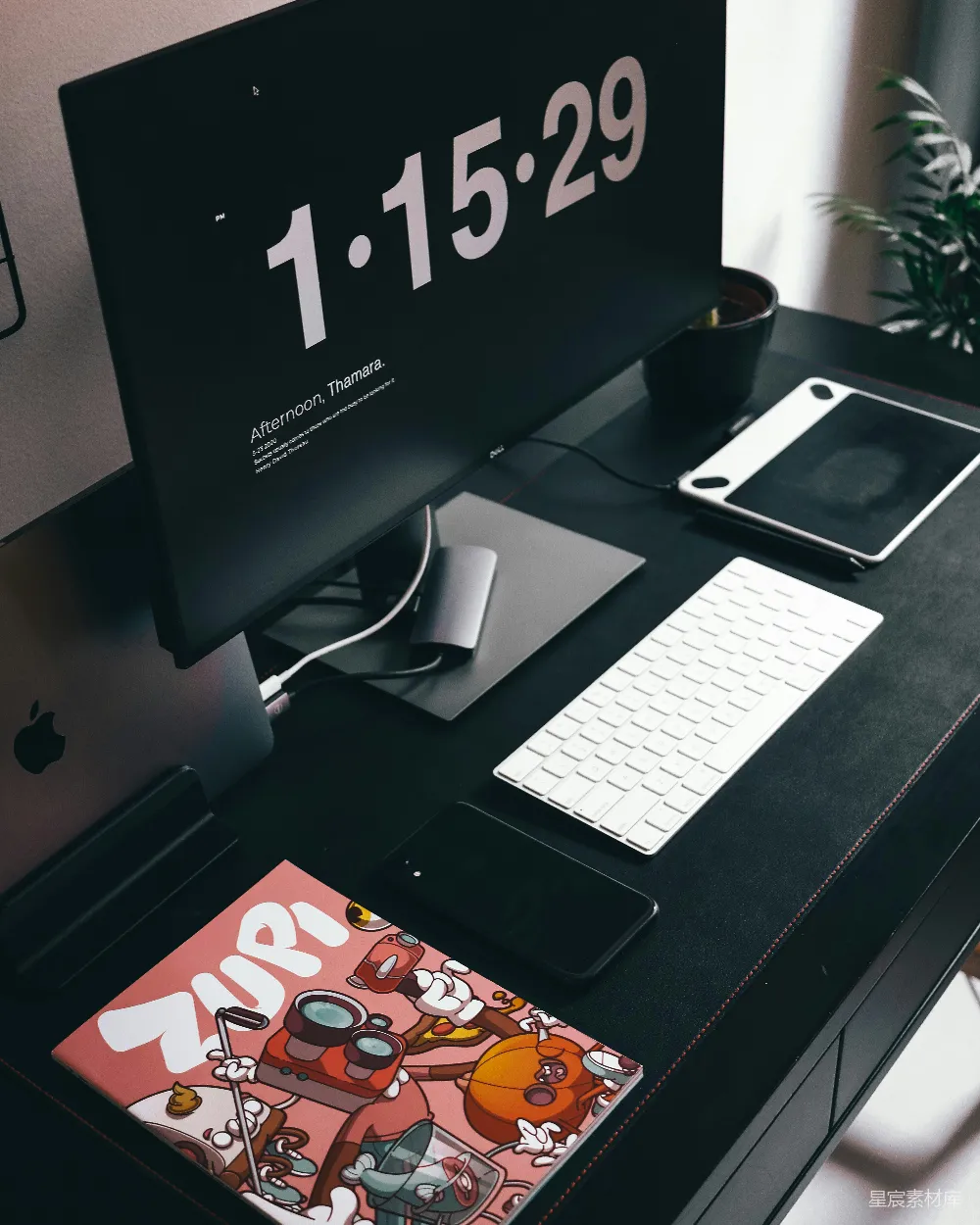 高清摄影  银色的iPhone 6放在黑色的桌子上