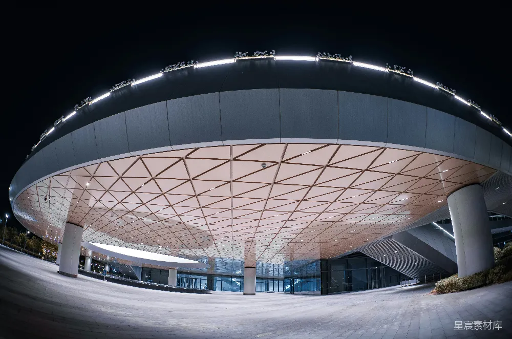 高清摄影 体育场 夜景 现代建筑 城市地标 灯光效果 夜幕下的未来感体育场
