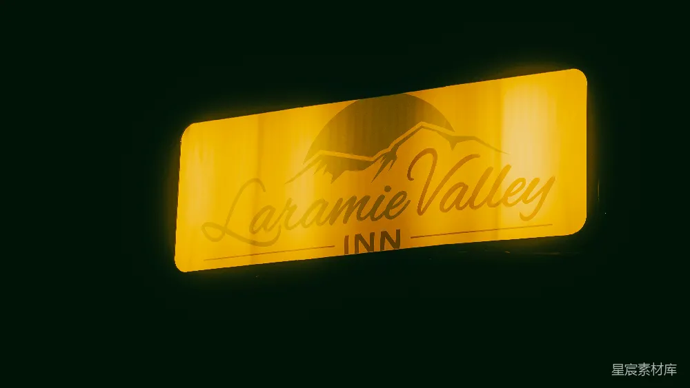 高清摄影 Laramie Valley Inn 酒店招牌 夜间场景 黄色灯光 度假村 Laramie Valley Inn的夜景招牌