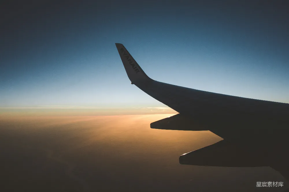 高清摄影 飞机 日落 天空 旅行 自然 日落时的飞机机翼