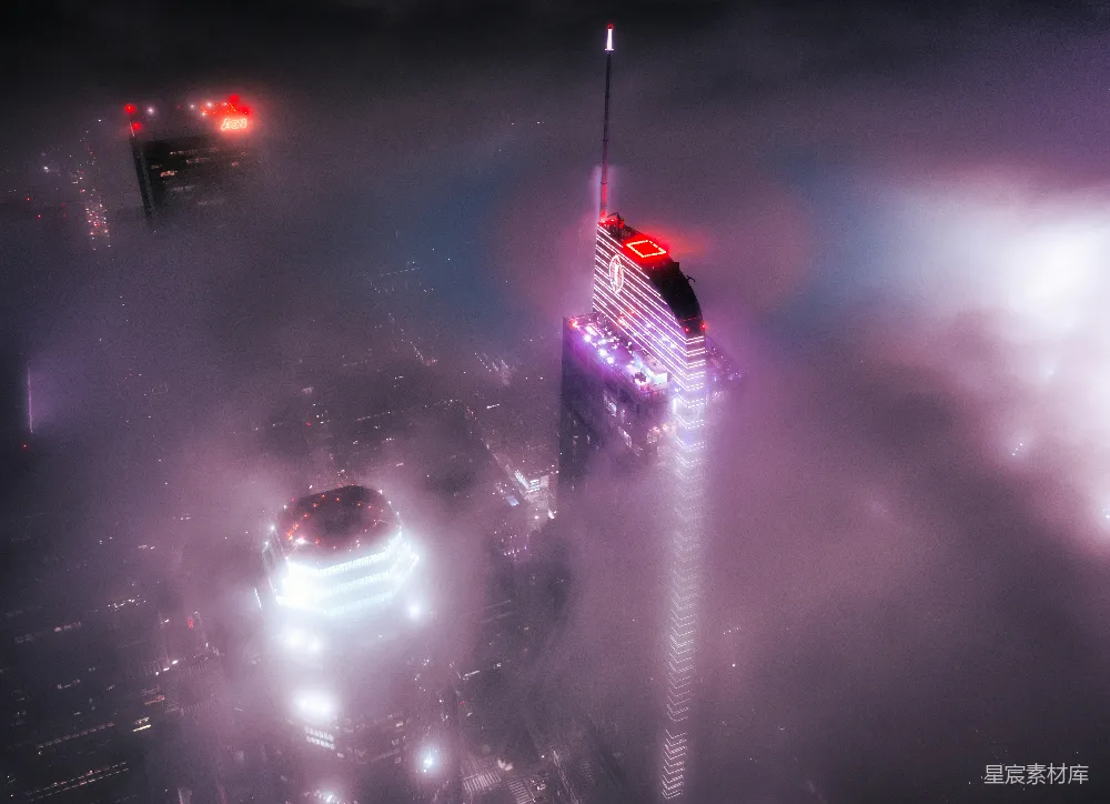 高清摄影 城市 夜景 摩天大楼 雾气 现代 雾中的霓虹高楼
