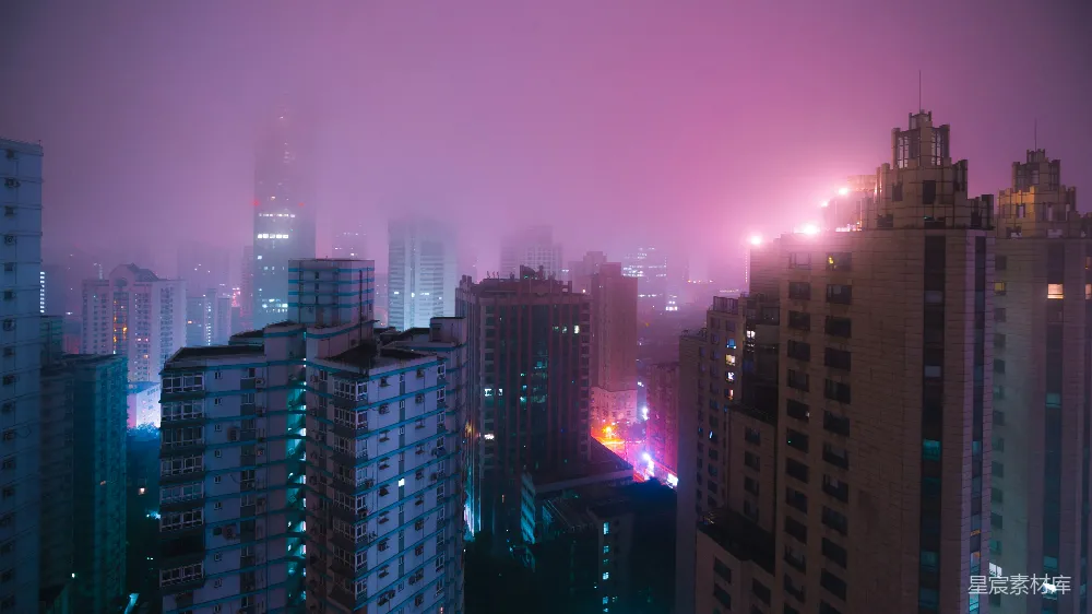 高清摄影 城市夜景 雾气缭绕 霓虹灯 高楼大厦 都市风光 雾中霓虹城市的夜景