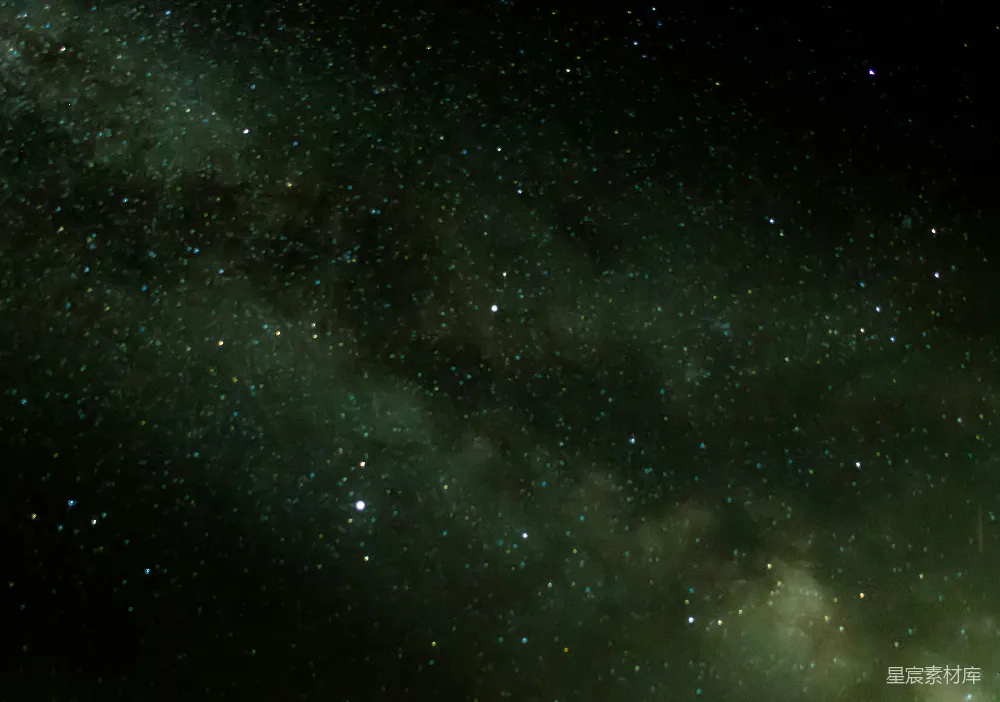这张图片展示了夜空中璀璨的星星和银河，银河呈现出柔和的绿色调，与深邃的夜空形成鲜明对比。星星点缀其间，营造出一种宁静而神秘的氛围，适合用作自然美景或宇宙探索的背景。