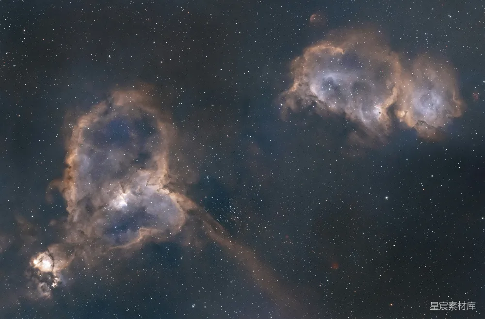 这张图片展示了夜空中两朵美丽的星云，它们在深邃的宇宙背景中显得格外引人注目。星云的形态各异，由不同颜色和亮度的气体和尘埃组成，散发出神秘而迷人的光芒。背景中点缀着无数的恒星，增添了画面的深度和广度。这张图片适合用于天文学教育、宇宙探索主题的